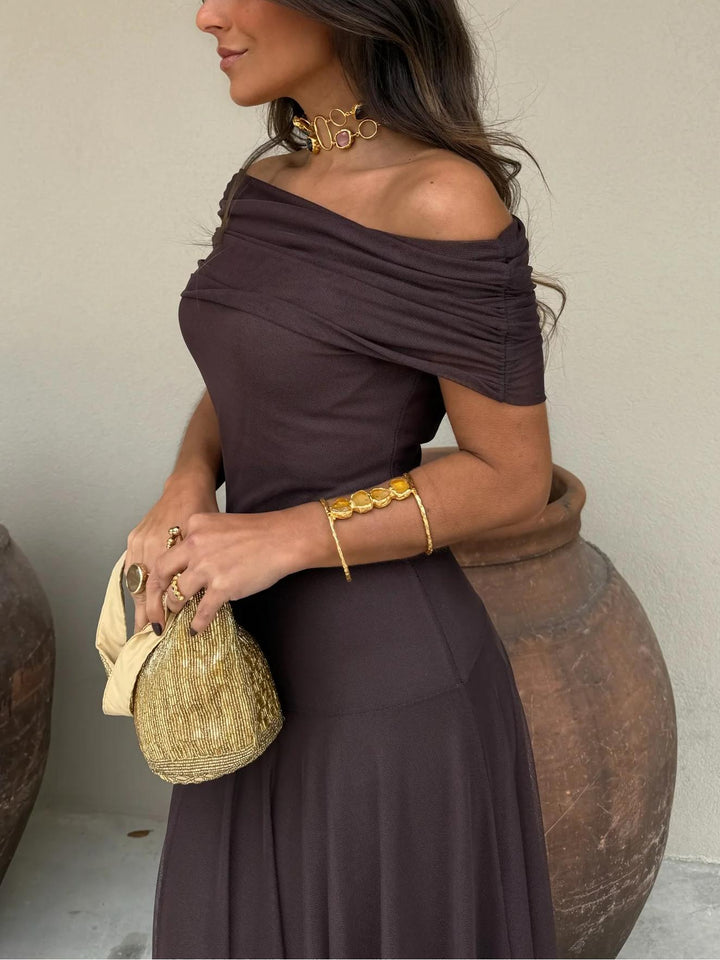 Chic women's off-shoulder maxi dress, versatile & elegant for various special events.
