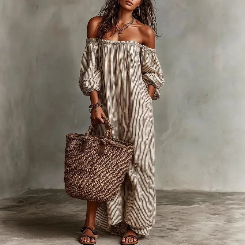 Elegant women's off-shoulder maxi dress with puff sleeves, perfect for summer vacations.