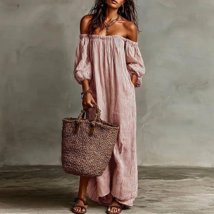 Women's off-shoulder maxi dress, a comfortable and elegant choice with fashionable puff sleeves.