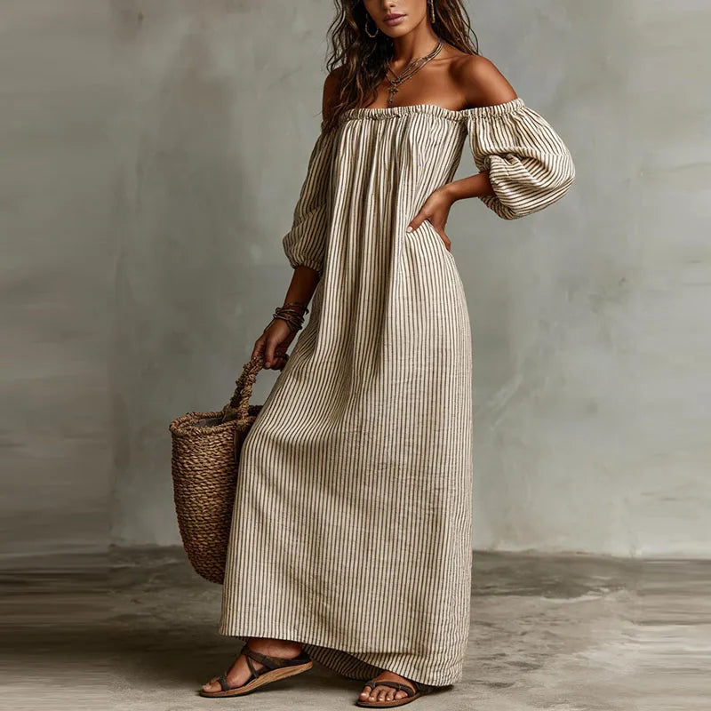 Chic off-shoulder maxi dress for women with elegant puff sleeves, perfect for resort wear.