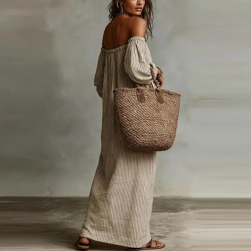 Versatile women's off-shoulder maxi dress with puff sleeves, suitable for casual & elegant occasions.