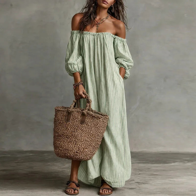 Effortless women's off-shoulder maxi dress with comfortable puff sleeves, great for spring/summer.