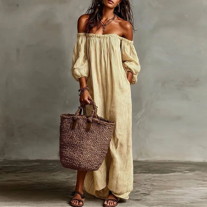 Stylish women's puff sleeve maxi dress, off-shoulder design, ideal for a comfortable vacation look.