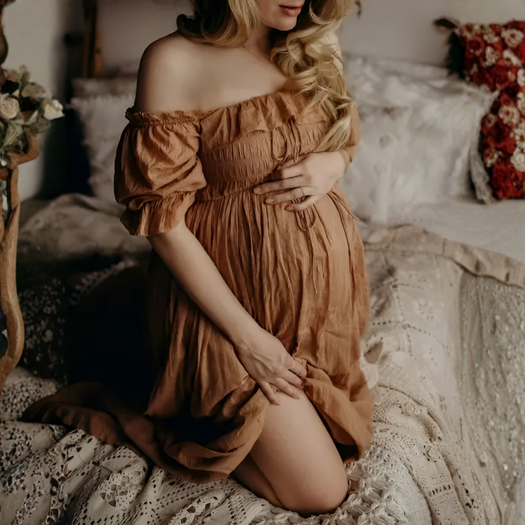 Elegant women's off-shoulder maxi maternity dress, perfect for pregnancy, baby shower, or summer casual wear.