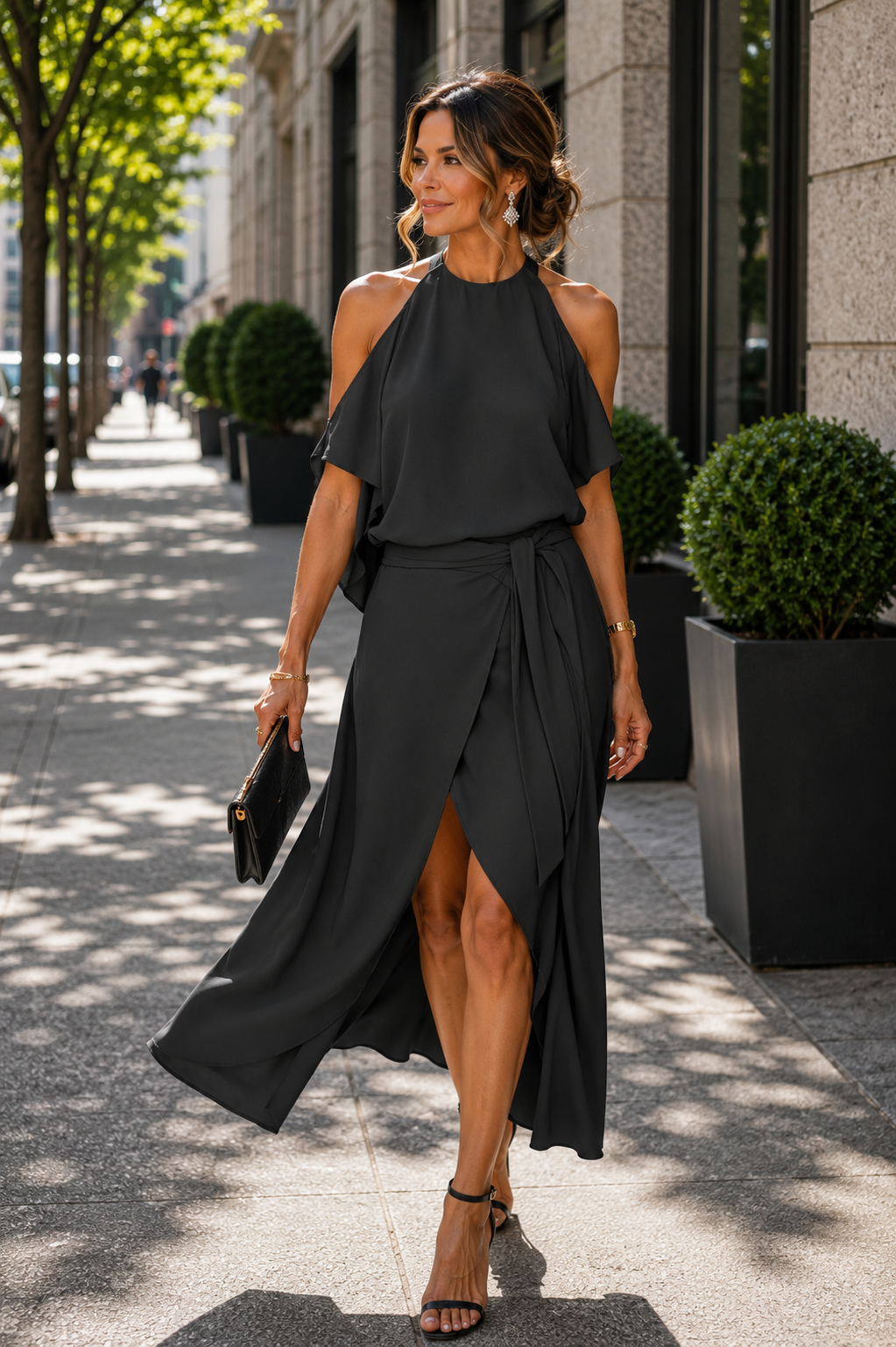 Stylish black off-shoulder midi dress for women, with an elegant asymmetrical hem. Great for special occasions.