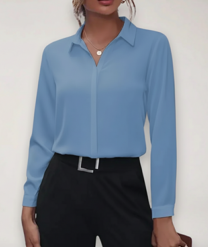 Formal women's button-down top, an elegant long-sleeve blouse for professional office wear and business meetings.