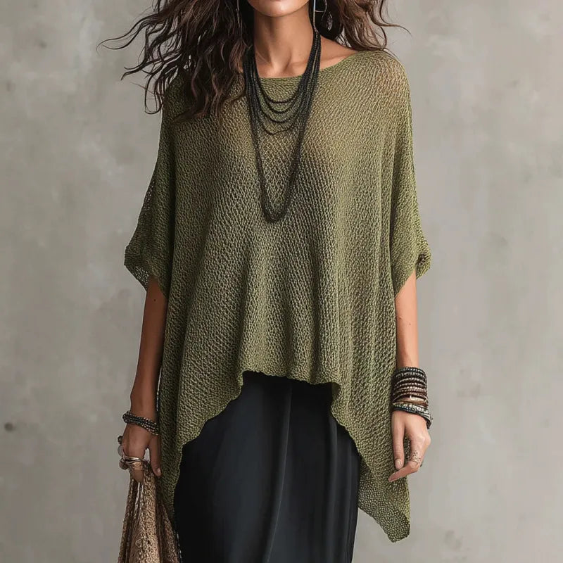 White women's draped boat neck poncho top. Fashionable loose fit tunic, perfect for comfortable, stylish layering.