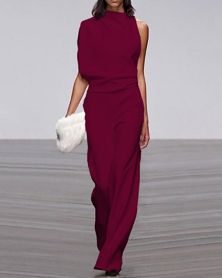 Modern women's evening jumpsuit: one-shoulder, high-neck, wide-leg. Ideal for special occasions.