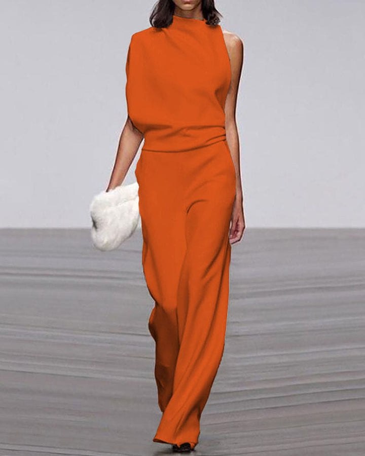 Statement one-shoulder high-neck wide-leg evening jumpsuit. Women's modern formal fashion.