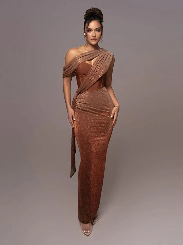 Elegant women's one-shoulder maxi dress, perfect for formal events & evening parties. Sculpted fit, statement style.