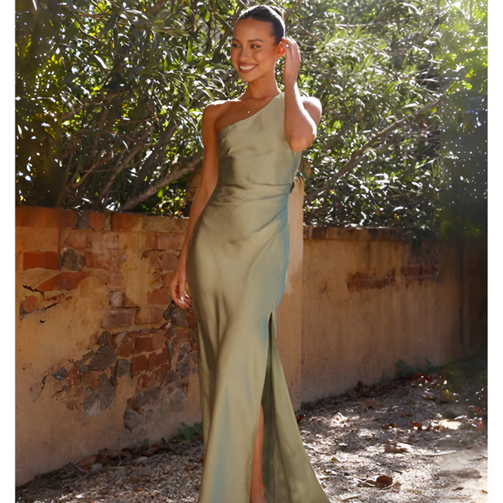 Sophisticated slim-fit one-shoulder evening gown, ideal for wedding guests or special occasions.