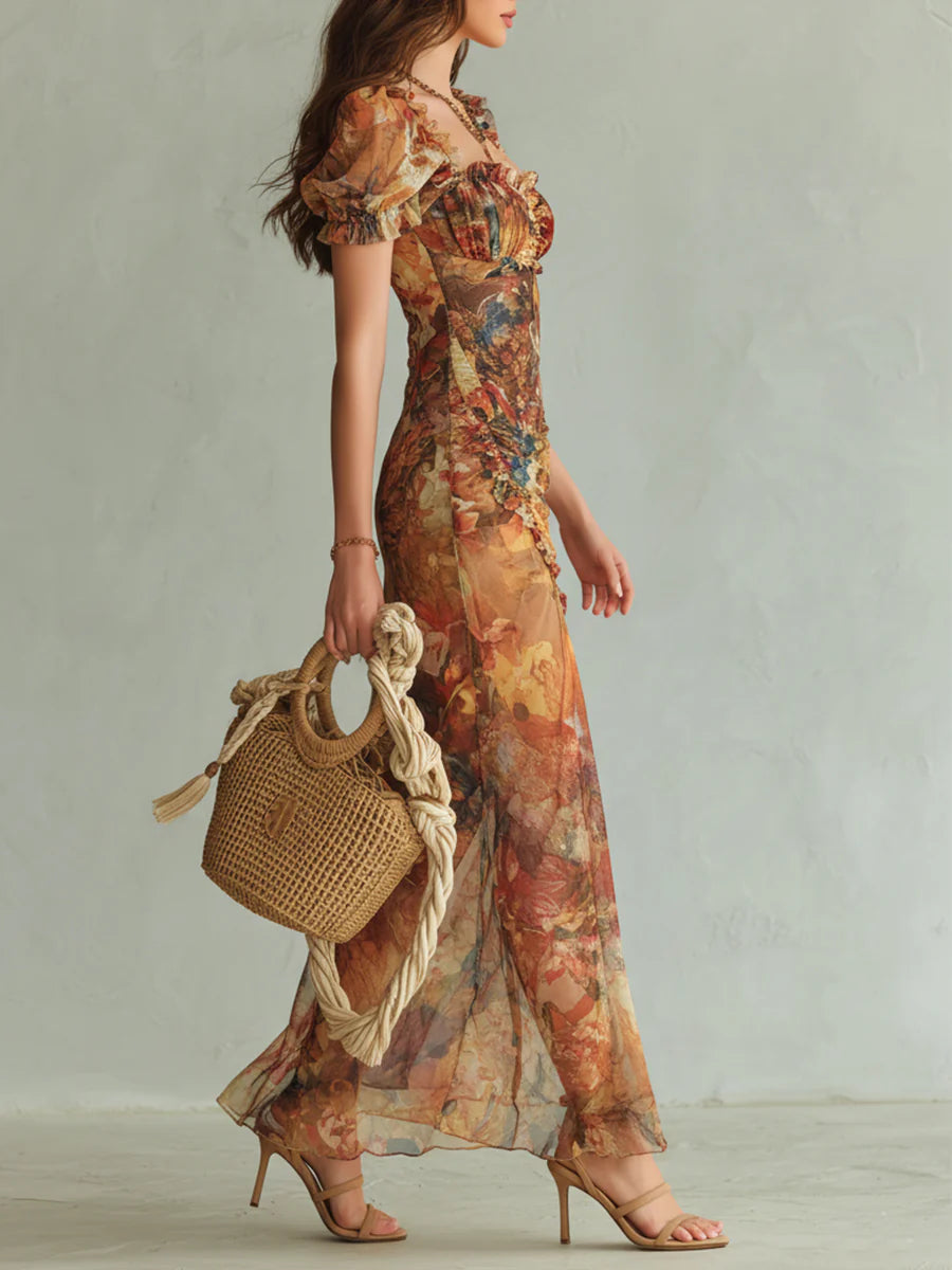 Women's vibrant orange floral maxi dress, elegant summer wedding guest attire with a flattering sweetheart neck.