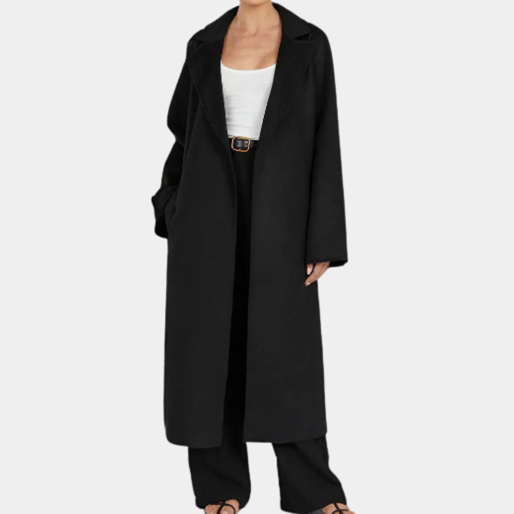 Chic women's oversized trench coat with an elegant belt. This long jacket offers versatile and modern fall/spring style.