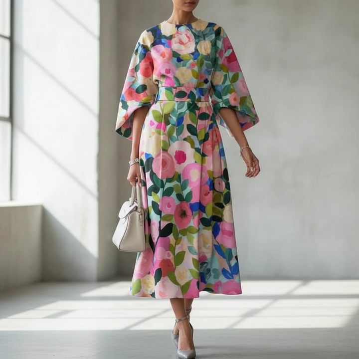 Elegant women's painterly floral puff sleeve midi dress, perfect for wedding guests or summer parties.