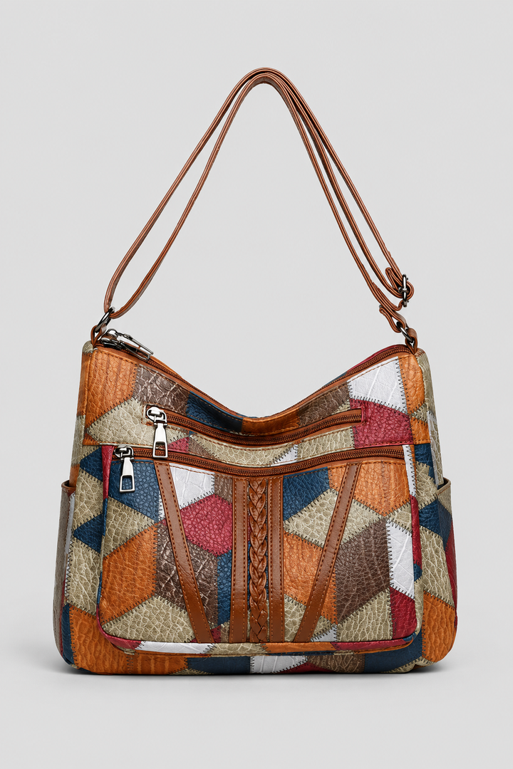 Elegant women's patchwork shoulder bag with artistic design, perfect for fashion-forward everyday carry. Unique stylish purse.