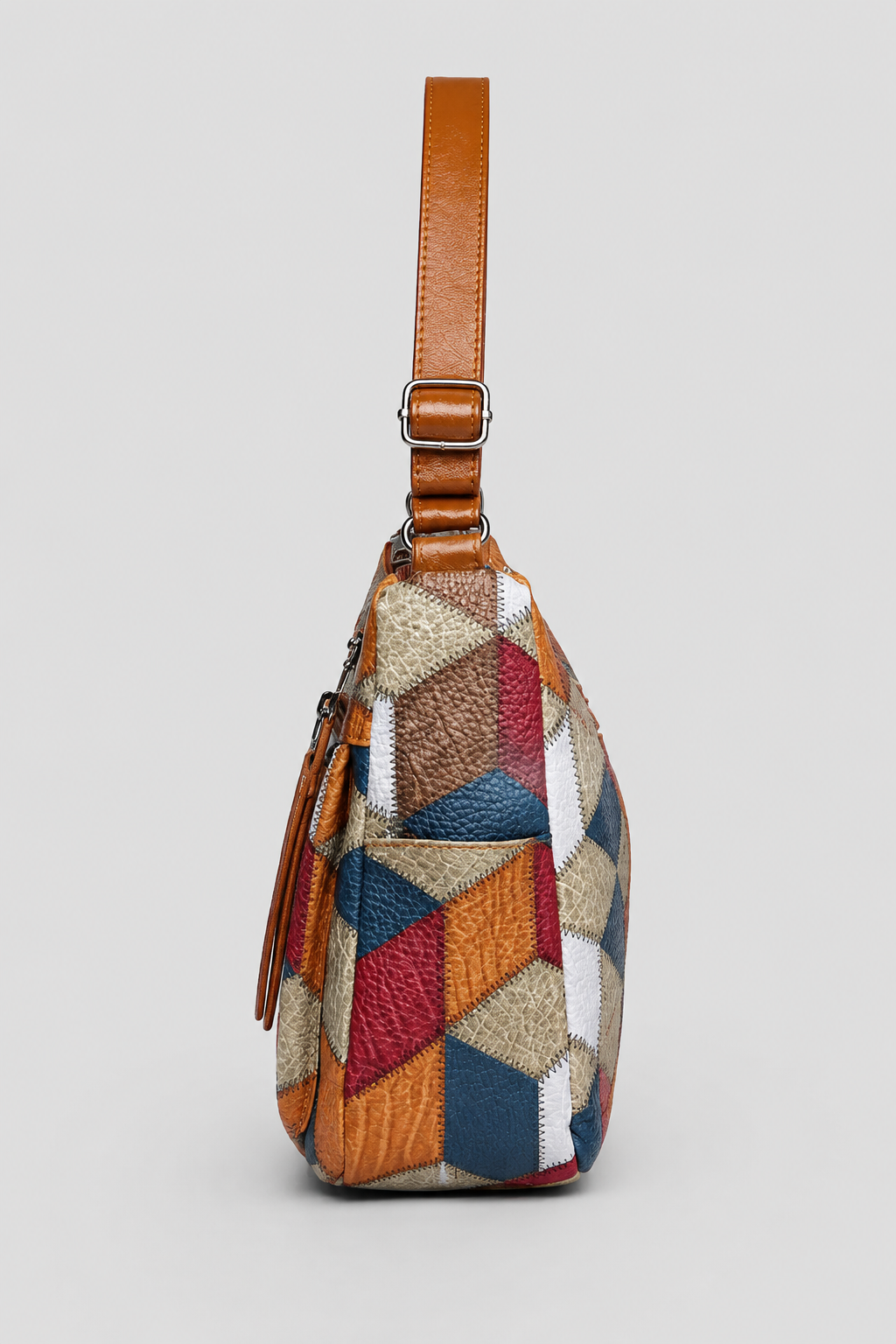 Artistic patchwork shoulder bag for women, an elegant and unique fashion accessory offering a sophisticated, stylish look.