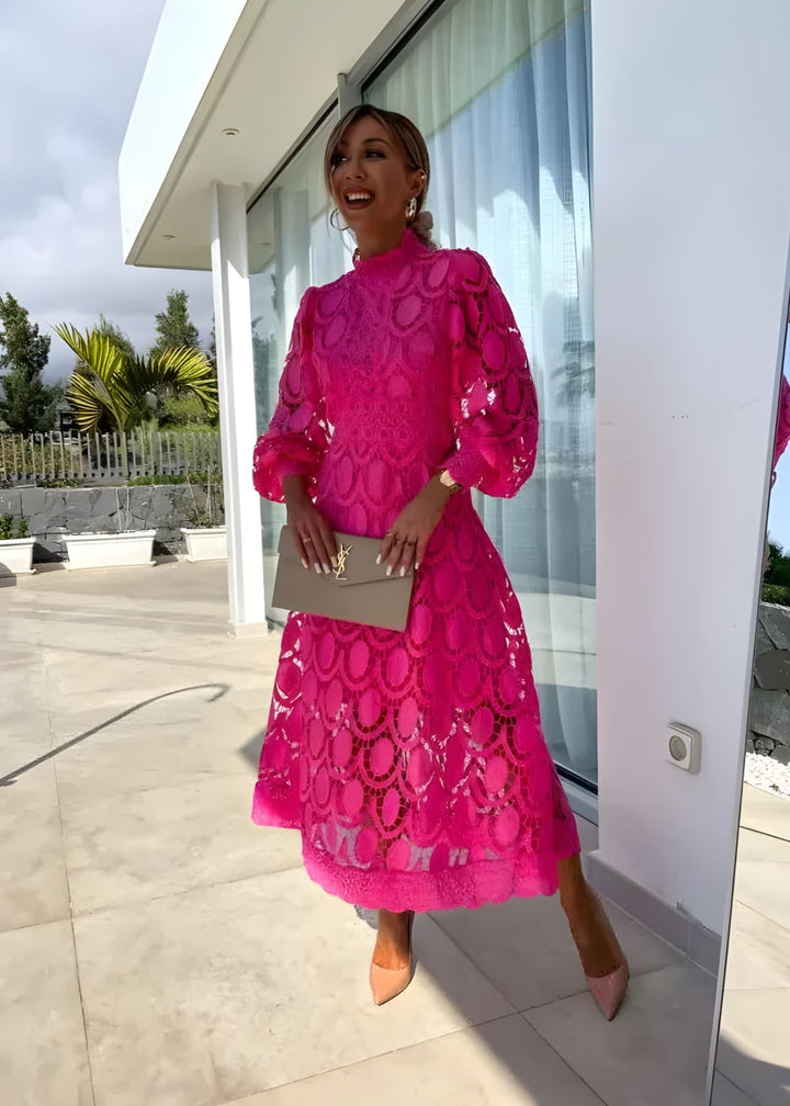 Chic women's patterned maxi dress for special occasions. Elegant, with puff sleeves & a flowing long design.