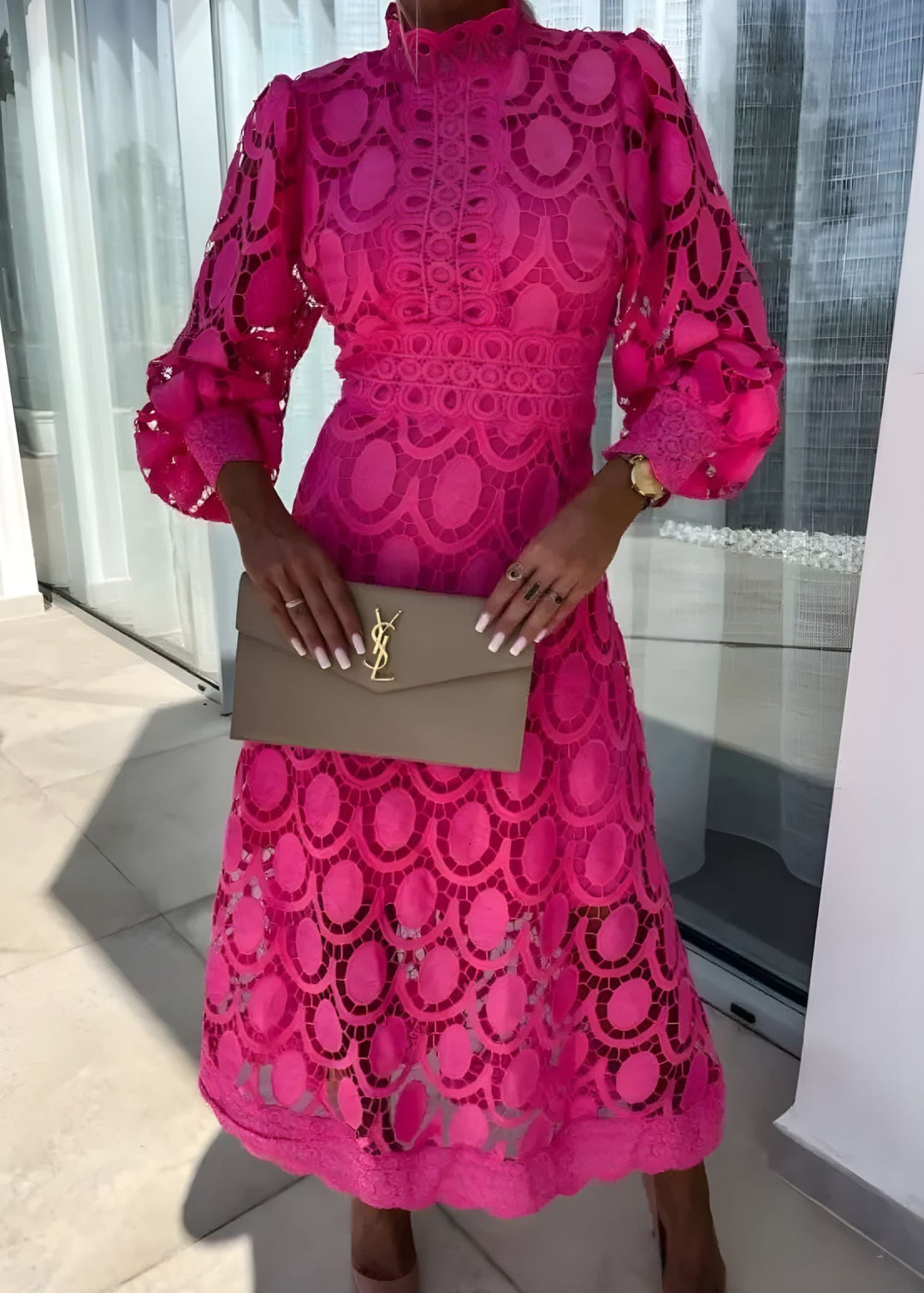 Stunning patterned maxi dress for women, featuring elegant print, full length, puff sleeves, and a flattering fit.