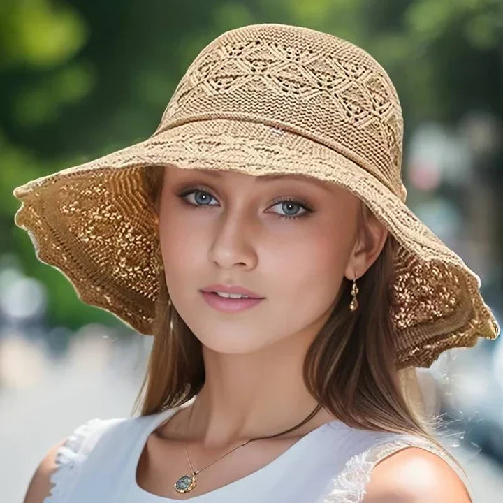 Travel-friendly foldable women's sun hat with an elegant pattern, ideal for beach trips and summer adventures.