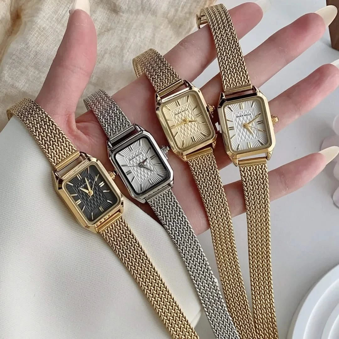 Elegant women's petite wristwatch, sleek design, classic fashion accessory for timeless style.