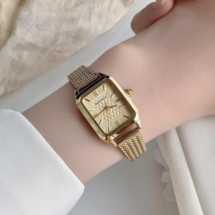 Fashionable women's petite wristwatch, elegant and sleek, a timeless accessory for ladies.