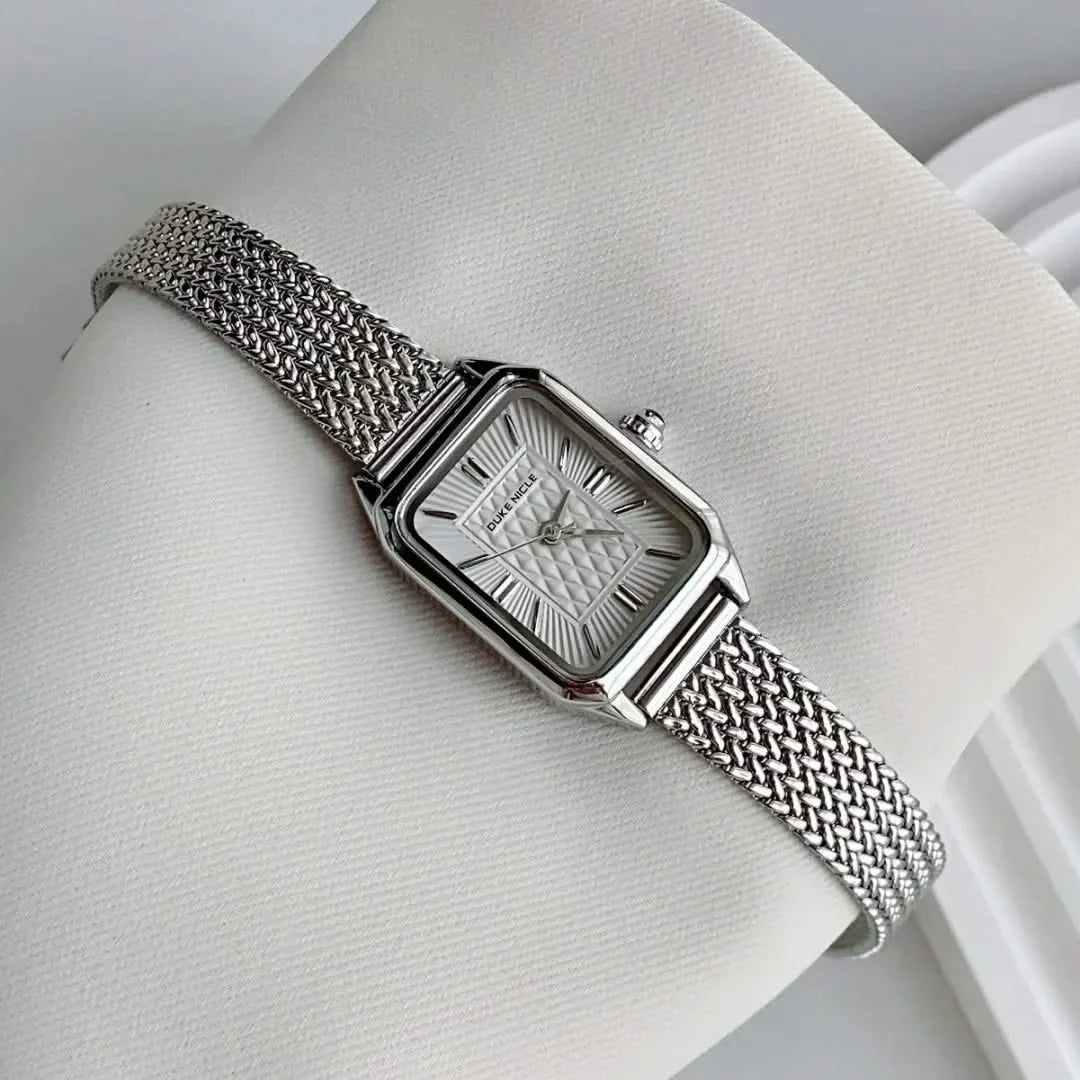 Sleek petite women's wristwatch, elegant design, a versatile and timeless ladies' accessory.