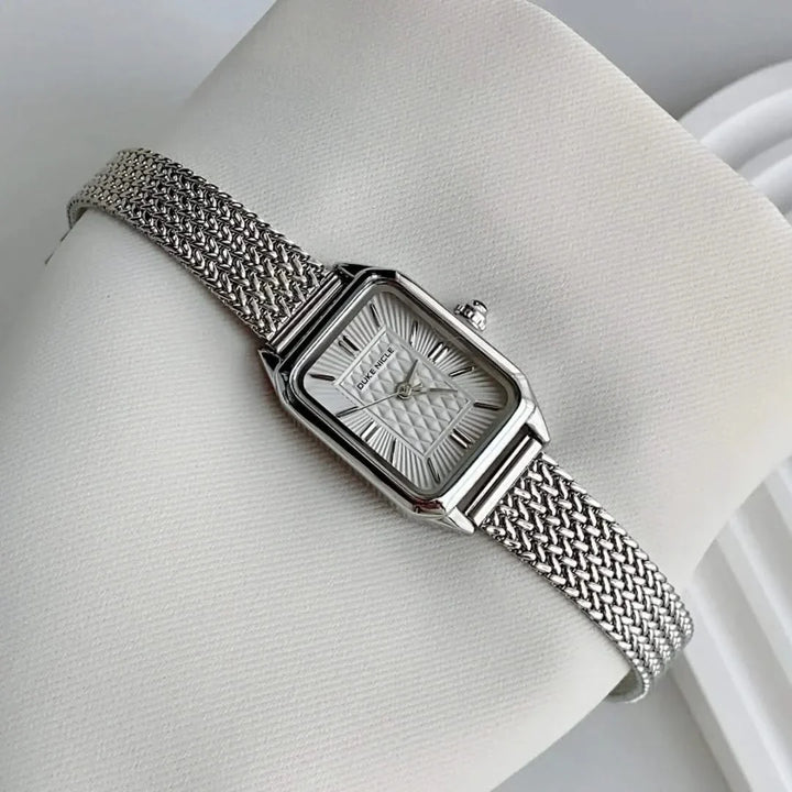 Sleek petite women's wristwatch, elegant design, a versatile and timeless ladies' accessory.