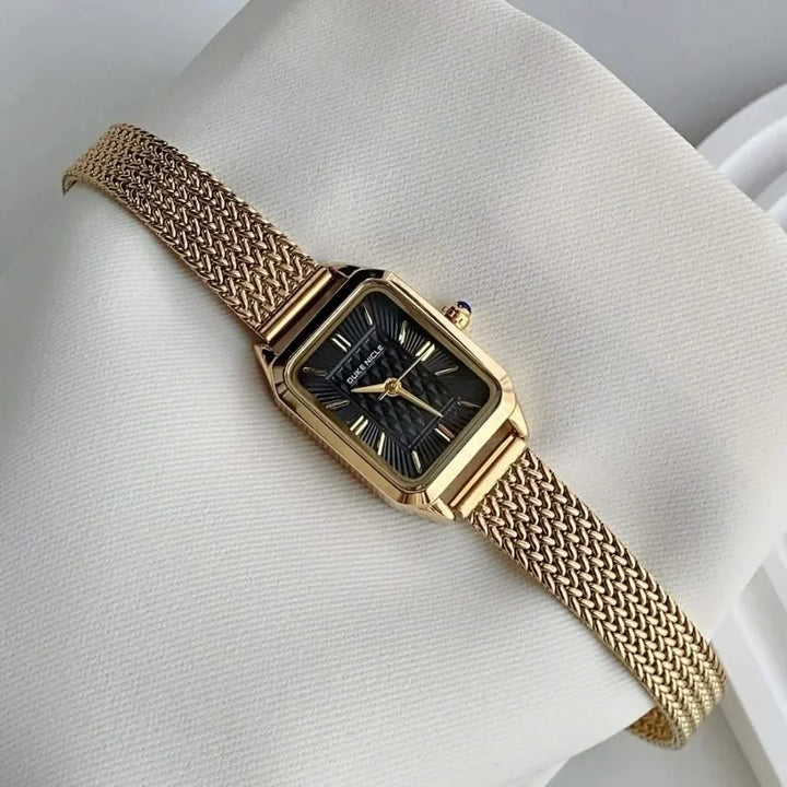 Petite women's wristwatch, elegant and sleek, a timeless fashion accessory for any occasion.