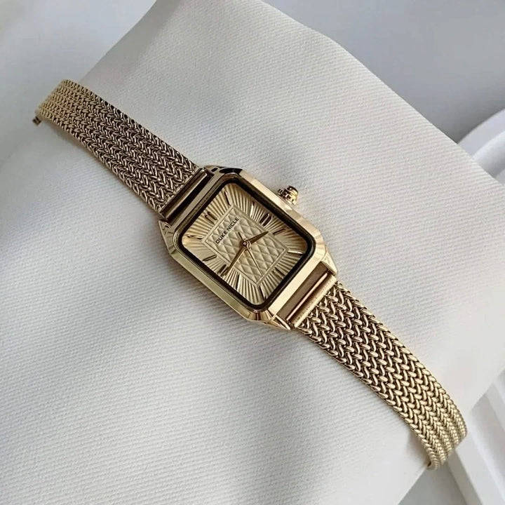 Elegant women's petite wristwatch with a sophisticated, timeless and sleek design.