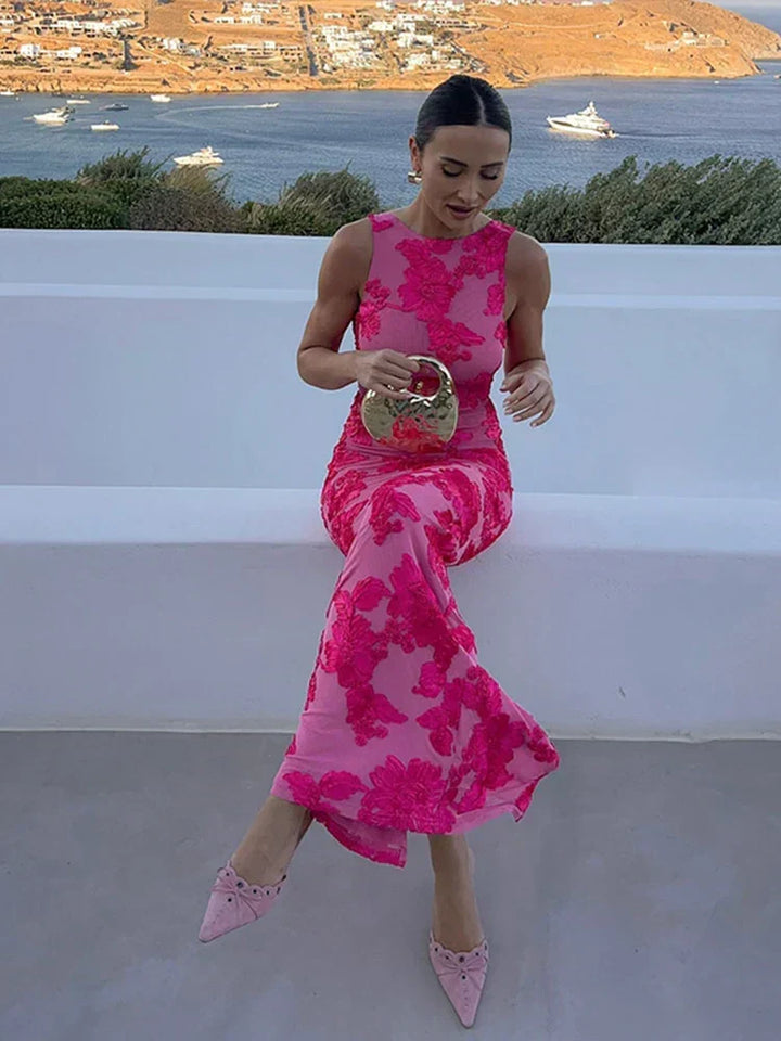 Women's formal pink floral high-neck maxi dress. Chic and elegant for wedding guests & special occasions.