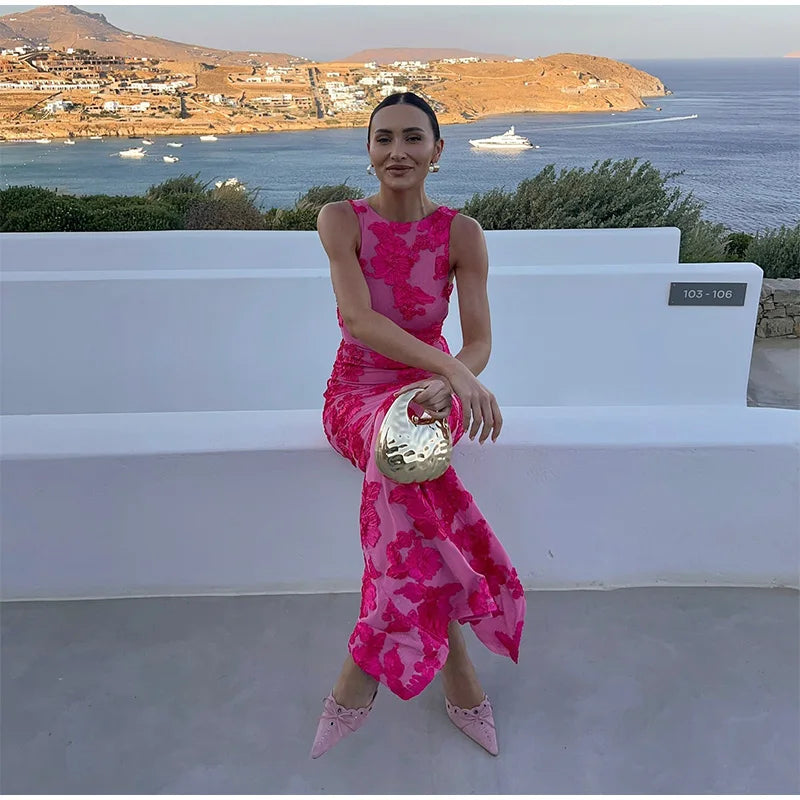 Stylish women's pink floral high-neck sleeveless maxi dress, an elegant choice for any party or wedding.