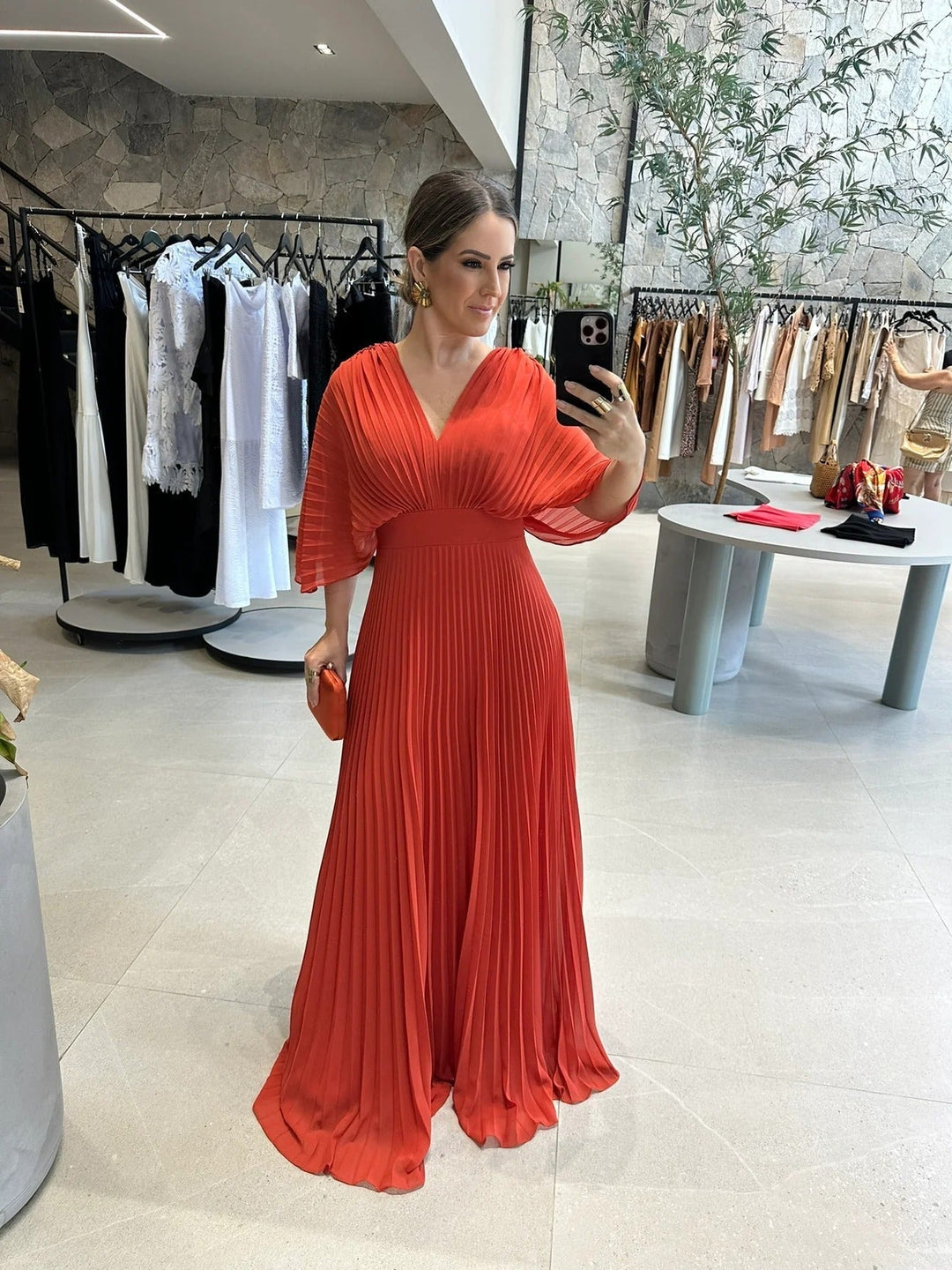 Long pleated women's dress with batwing sleeves, perfect for weddings, galas, and special occasions.