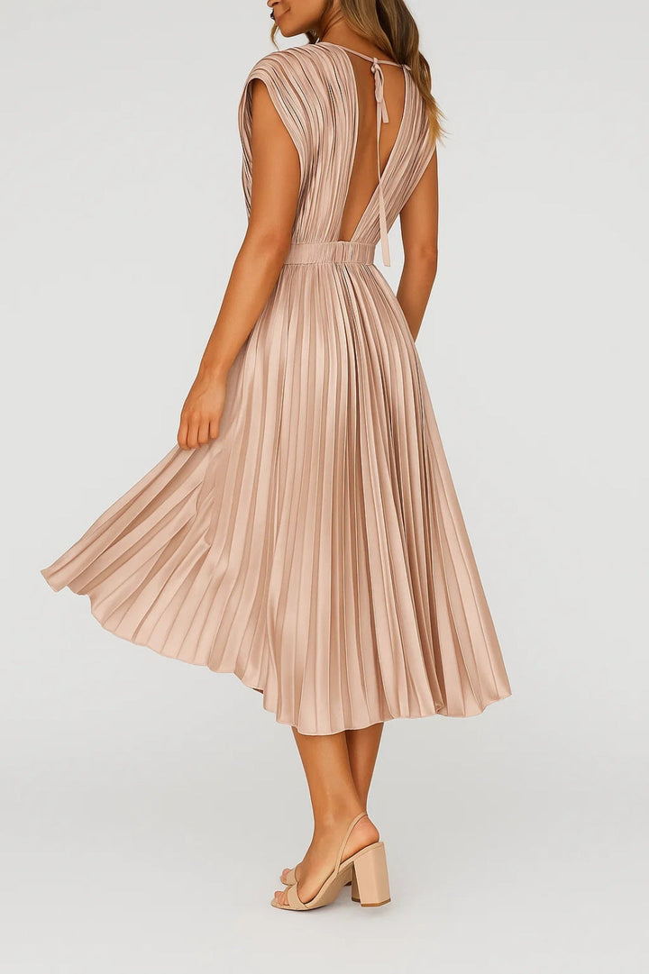 Stylish women's midi dress with deep V-neck & delicate pleats, ideal for wedding guest attire or evening wear.