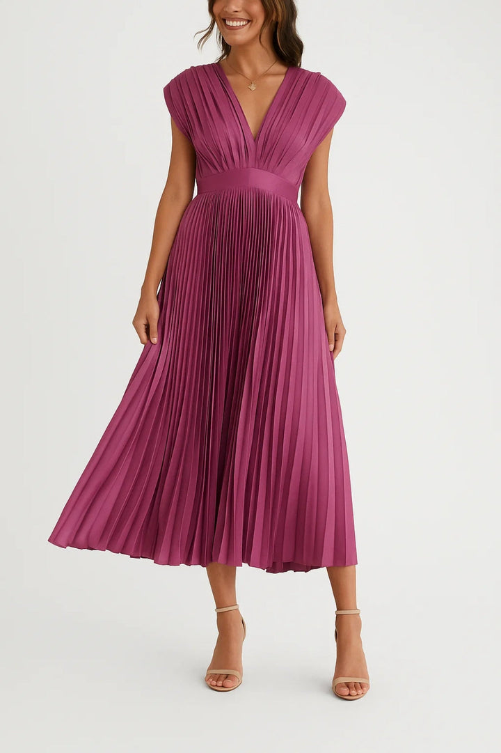 Beautiful women's deep V-neck pleated midi dress, perfect for a sophisticated wedding guest look or formal event.