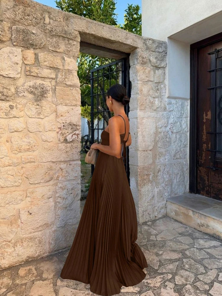 Elegant women's pleated halter maxi dress, perfect for wedding guest attire & formal events.