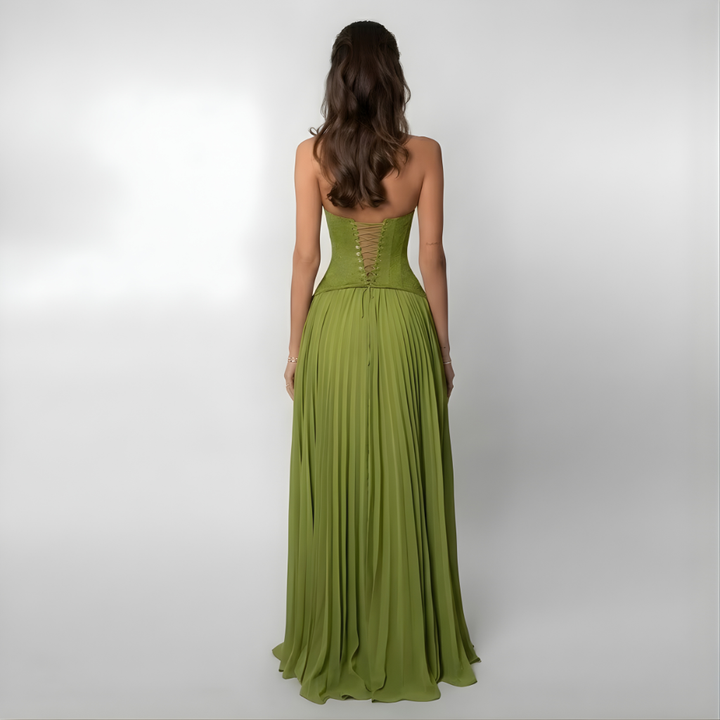 Stunning women's open-back halter maxi dress, a pleated evening gown perfect for special occasions & elegance.