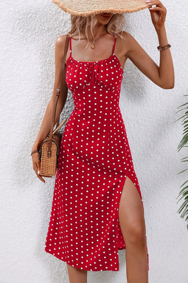 Elegant women's pleated halter neck midi dress with subtle dot pattern. Perfect for versatile summer wear.