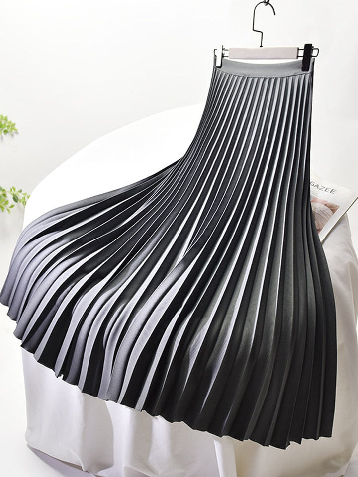 Women's elegant high waist pleated midi skirt. A versatile, chic bottom for fashion-conscious women.