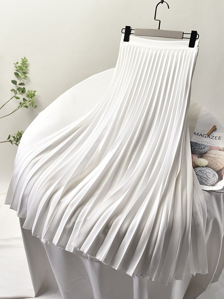 Sophisticated women's pleated midi skirt. High-waisted, elegant, and a versatile fashion bottom.