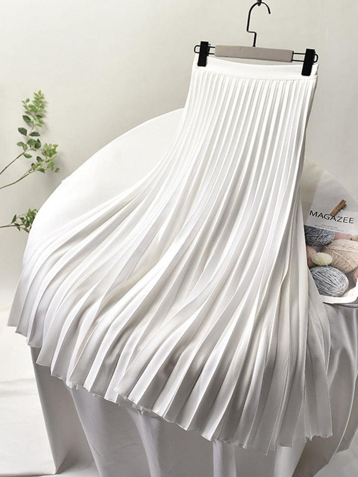 Sophisticated women's pleated midi skirt. High-waisted, elegant, and a versatile fashion bottom.