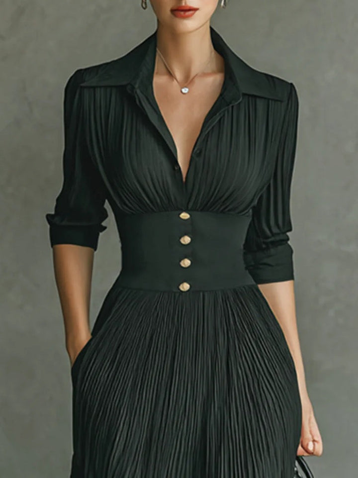 Sophisticated women's belted maxi dress with pleated details & a smart lapel, offering versatile fashion.