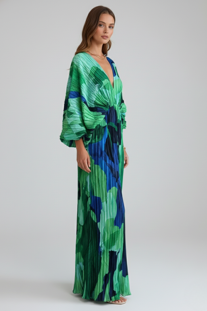 Flowy pleated maxi dress for women, featuring a chic V-neckline and elegant high side slit. Ideal party wear.