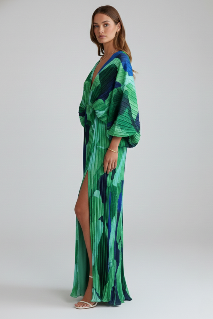 Effortlessly elegant women's V-neck pleated maxi dress with a side slit, perfect for formal or vacation outfits.