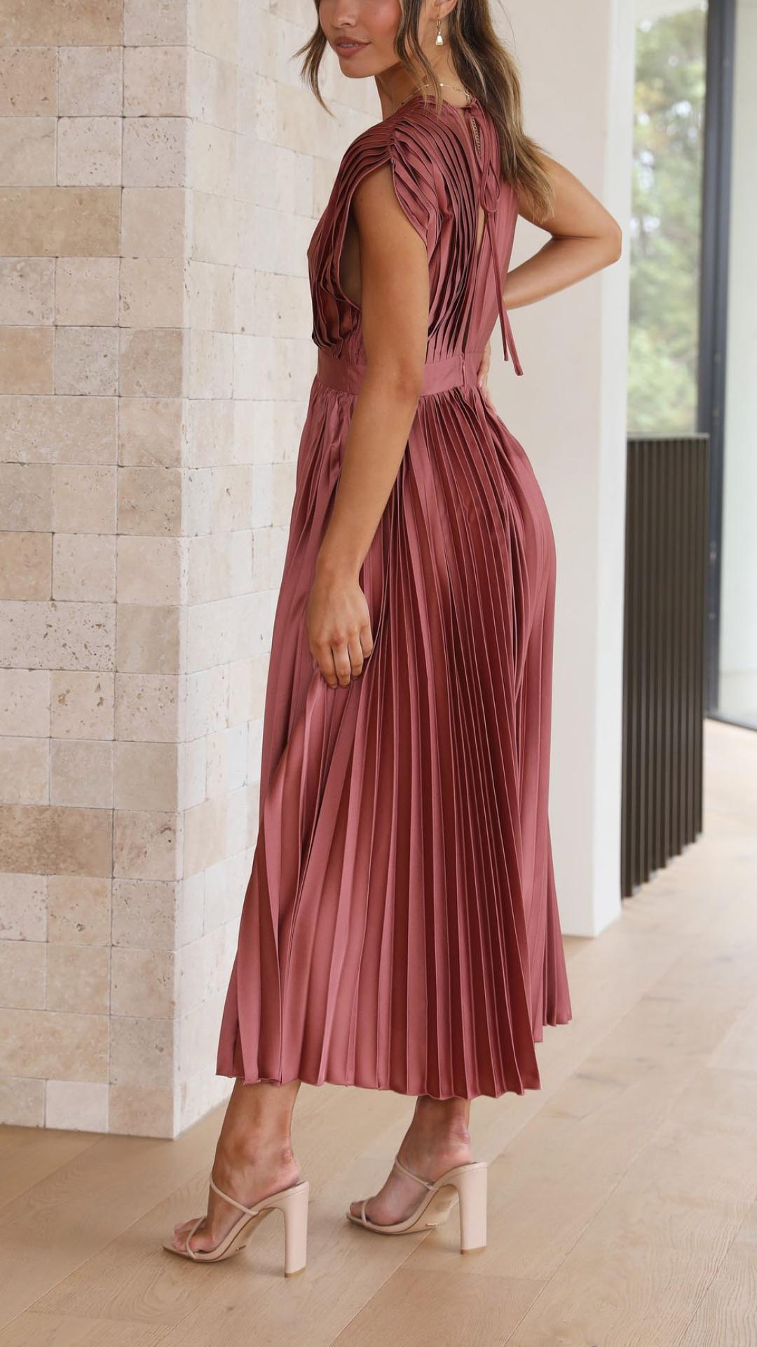 Sleeveless Pleated Maxi Dress with a sophisticated V-neck, perfect for evening events.
