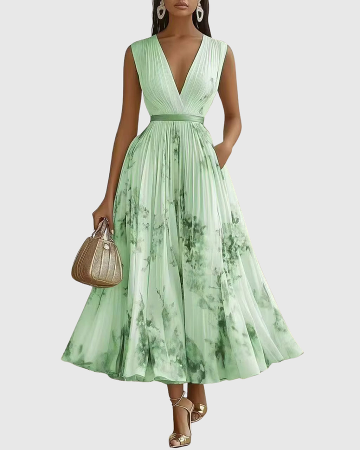 Women's floral print long sleeve maxi dress with sophisticated pleats and a chic V-neck.