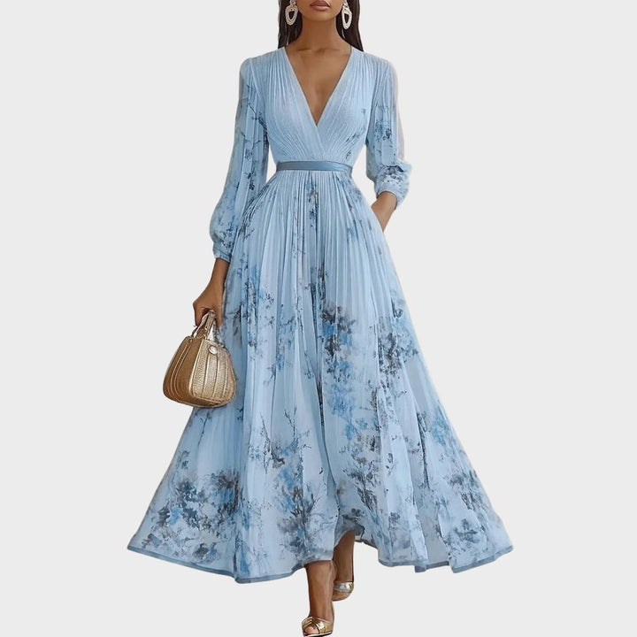 Beautiful women's long sleeve pleated maxi dress in an elegant style, ideal for events.