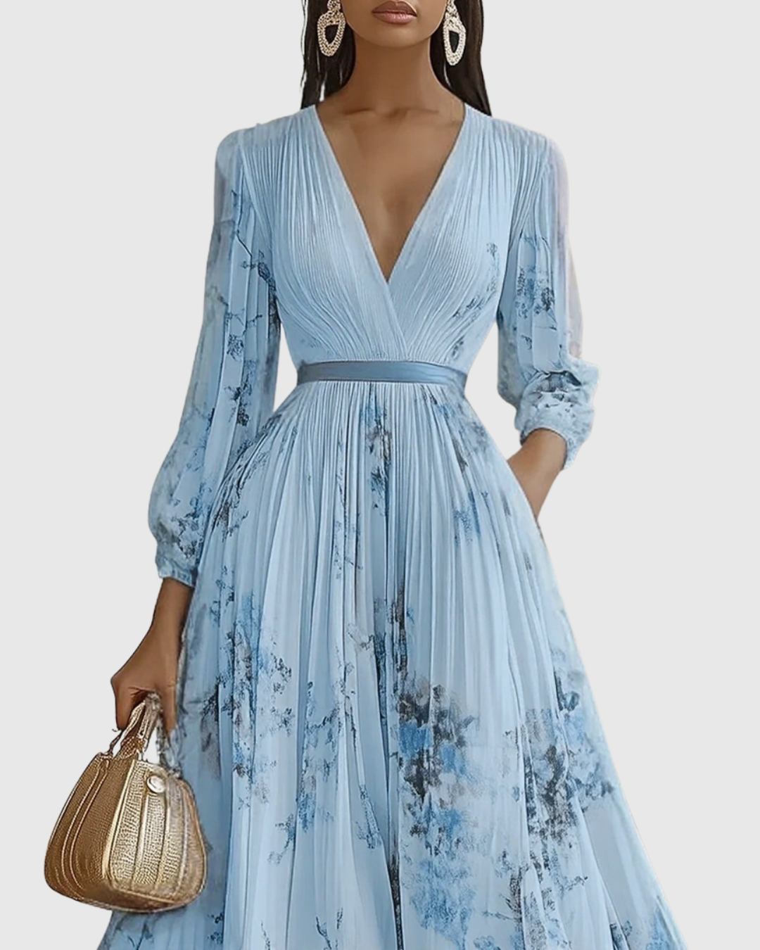 Maxi dress for women: elegant floral print, long sleeves, and sophisticated pleated design.