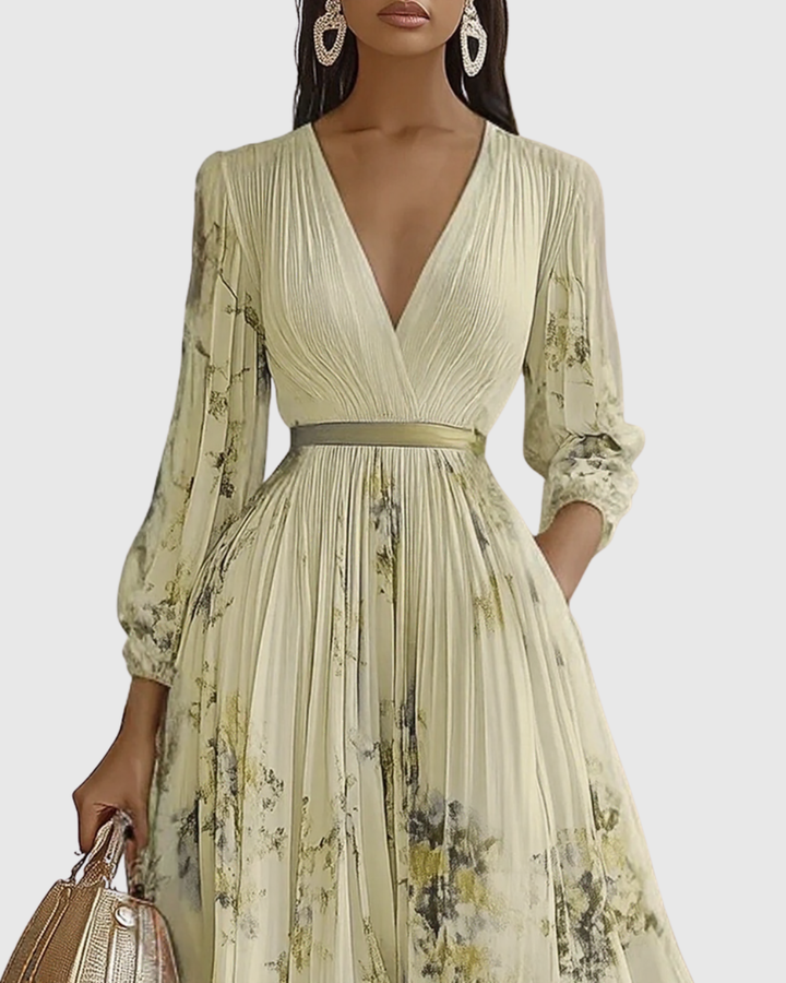 Women's floral long sleeve maxi dress with elegant pleats, suitable for many formal occasions.