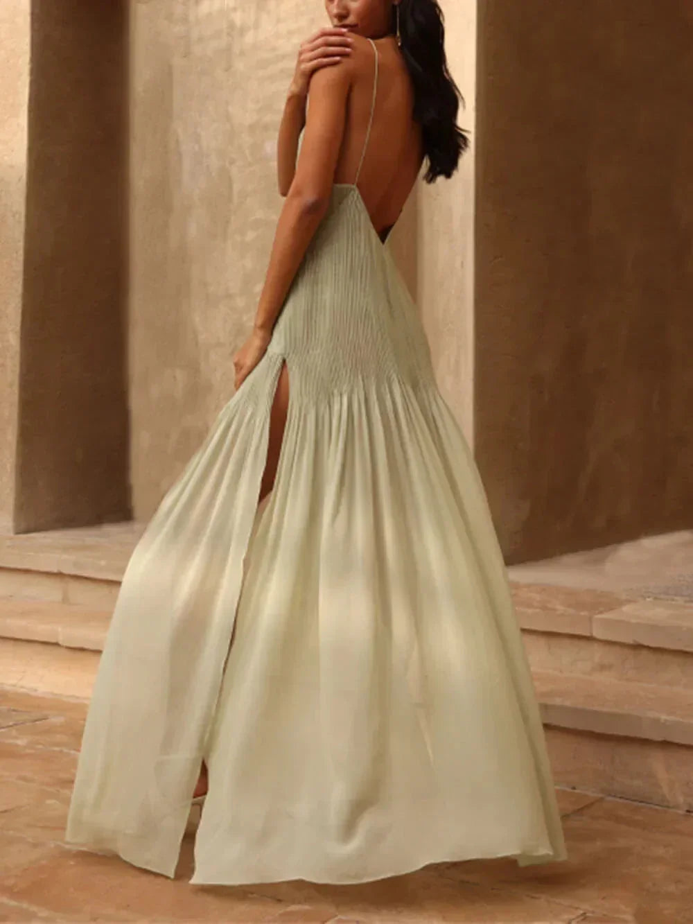 Graceful women's pleated maxi dress, perfect for vacations, evening wear, or as a stylish wedding guest outfit.