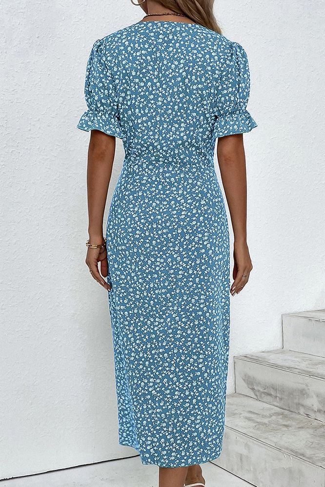 Spring style women's pleated midi dress. Elegant, flowy, and comfortable for the season.